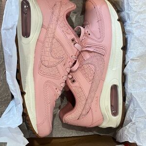 Nike Pink Sneakers with Textured Fabric and Cushioned Sole